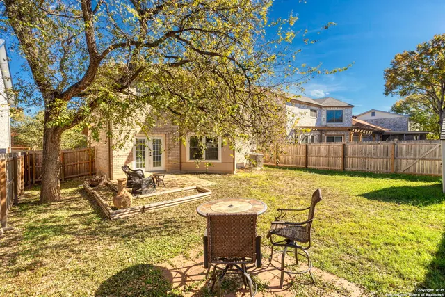 a view of a swimming pool with a lounge chairs