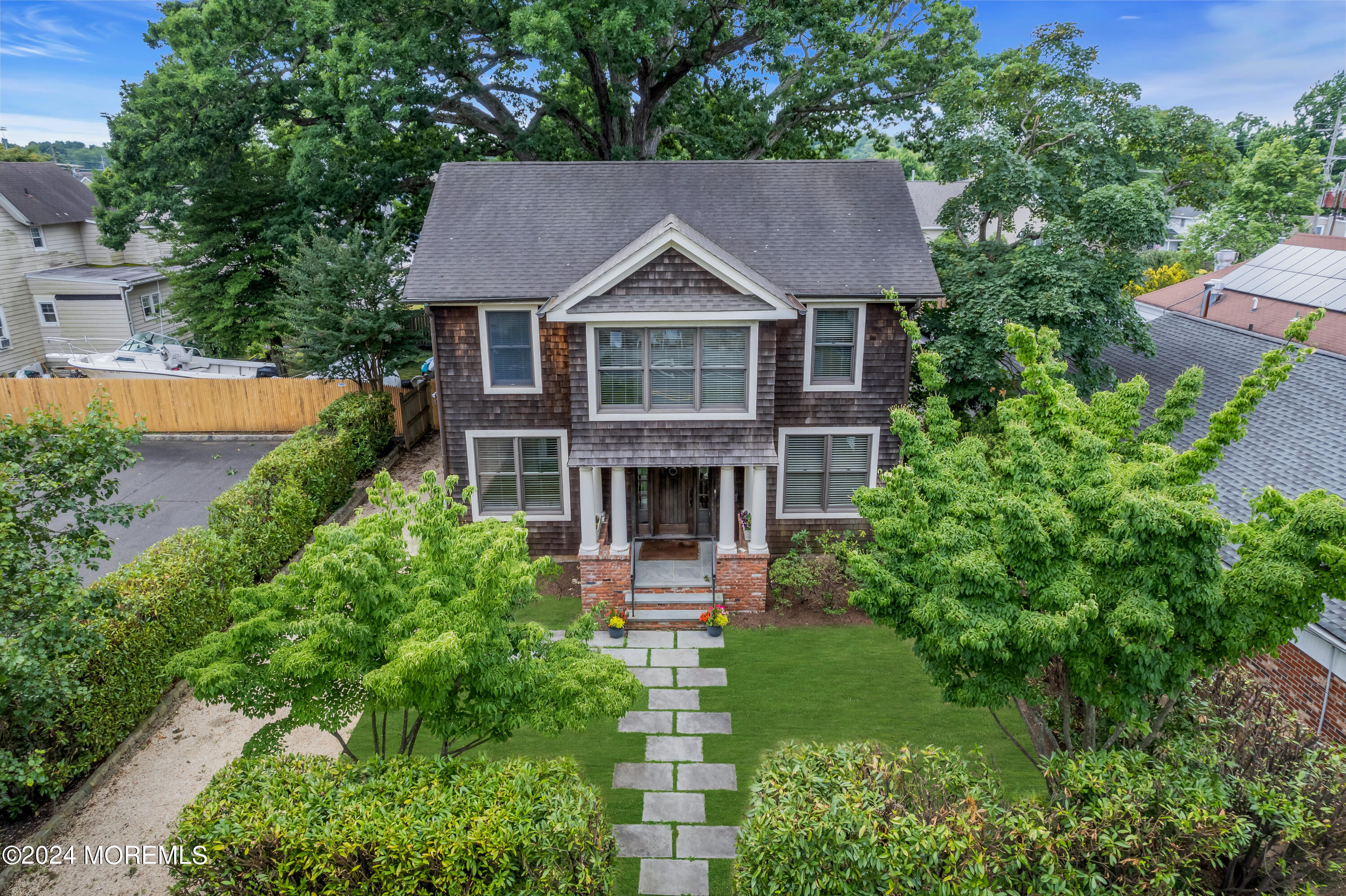 95 River Road Rumson, NJ 07760 - Photo 18 of 19 a front view of house with yard and green space