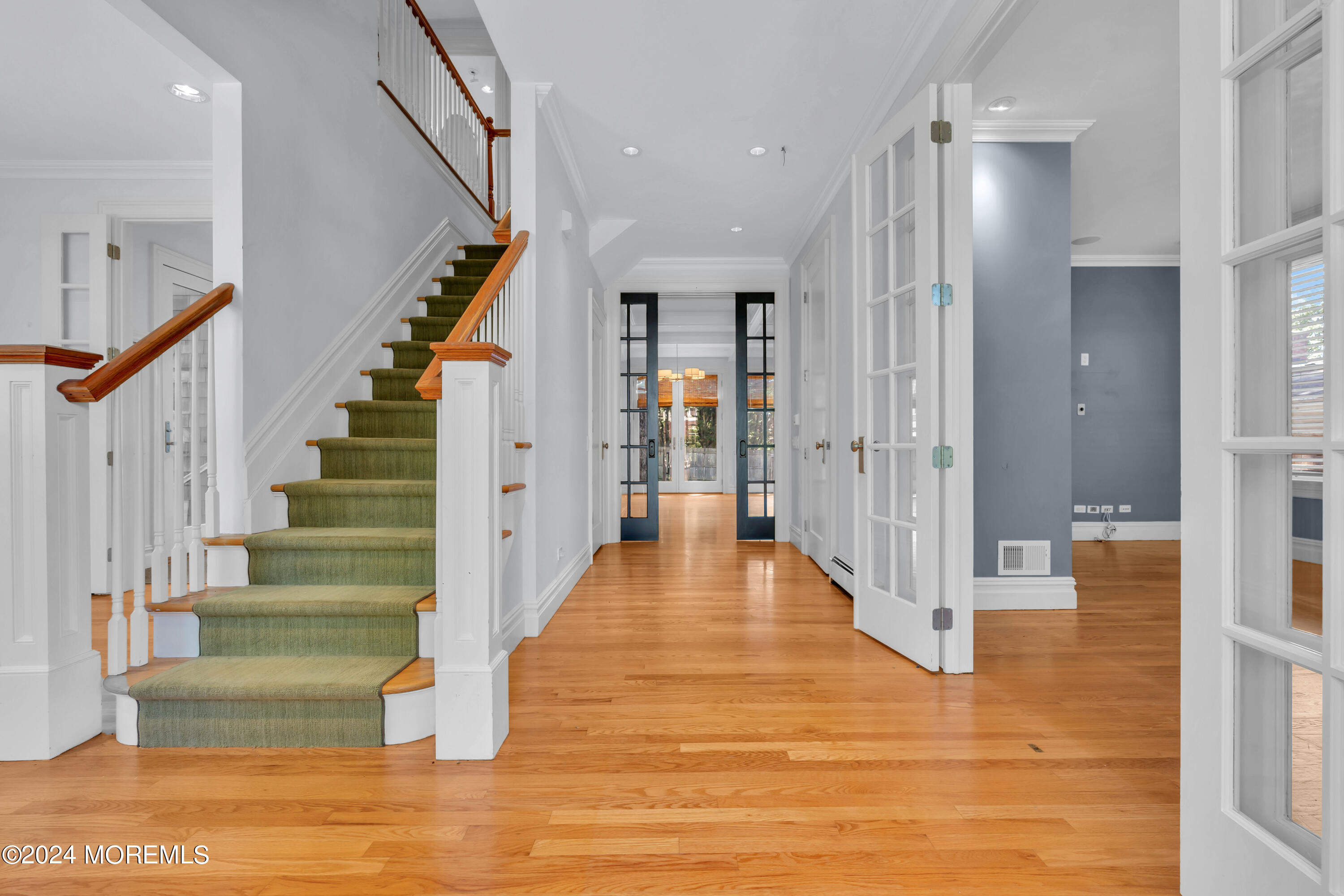 95 River Road Rumson, NJ 07760 - Photo 6 of 19 a view of entryway and hall with wooden floor