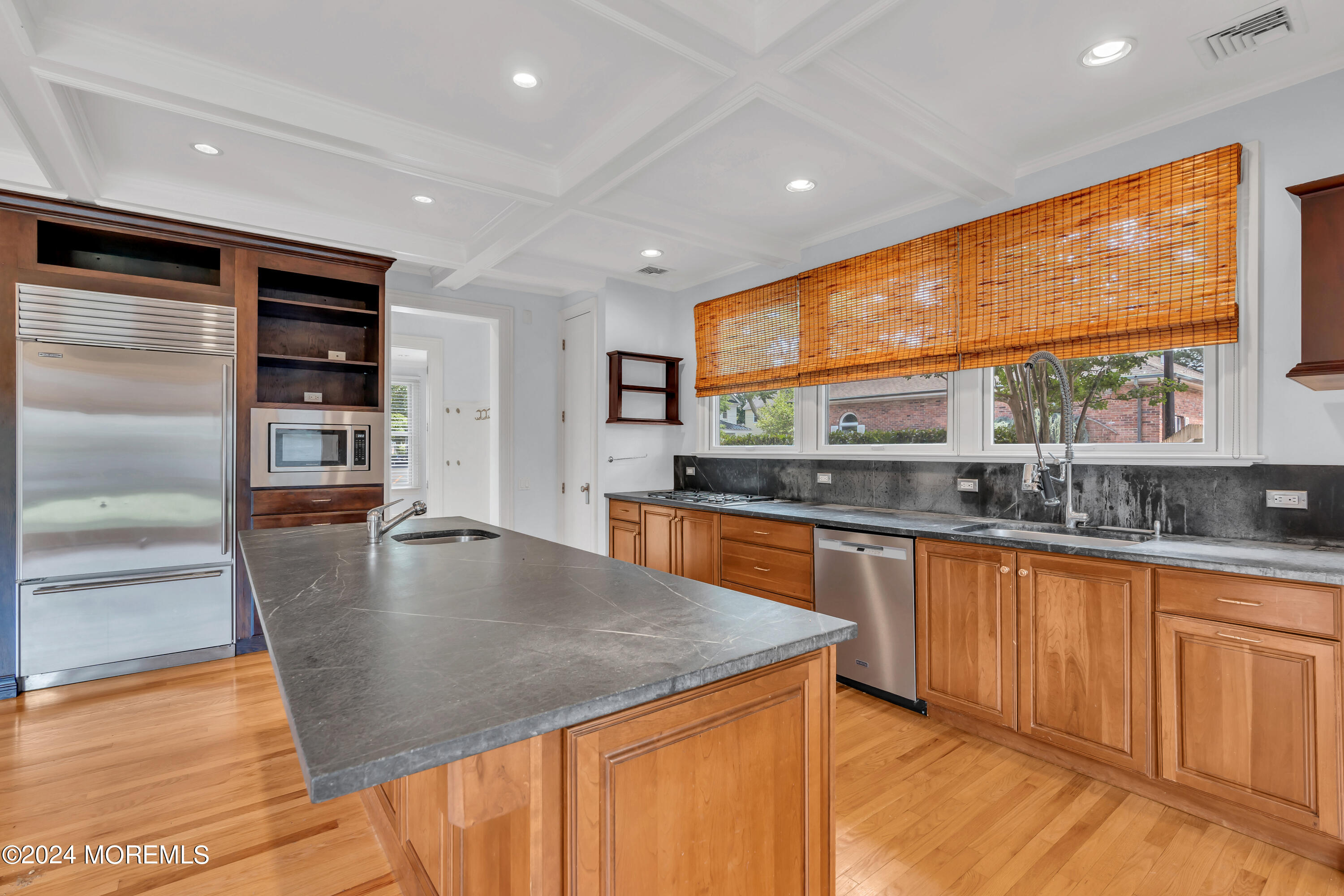 95 River Road Rumson, NJ 07760 - Photo 9 of 19 a kitchen with stainless steel appliances granite countertop a sink and cabinets