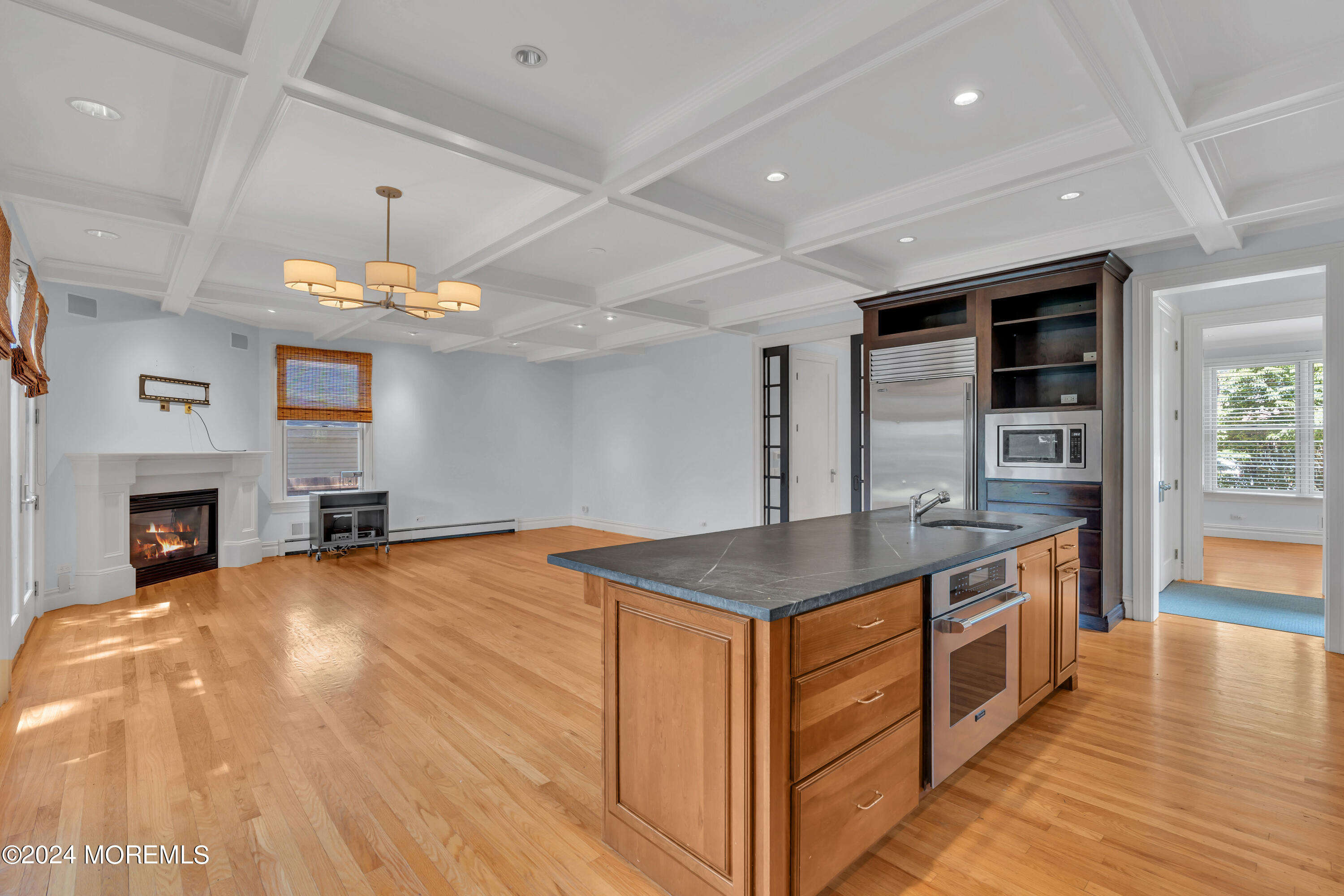 95 River Road Rumson, NJ 07760 - Photo 10 of 19 a kitchen with a stove and a wooden floors