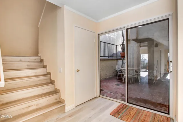 a view of a glass door and glass door