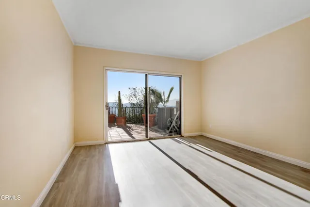 a view of a room with a sliding door