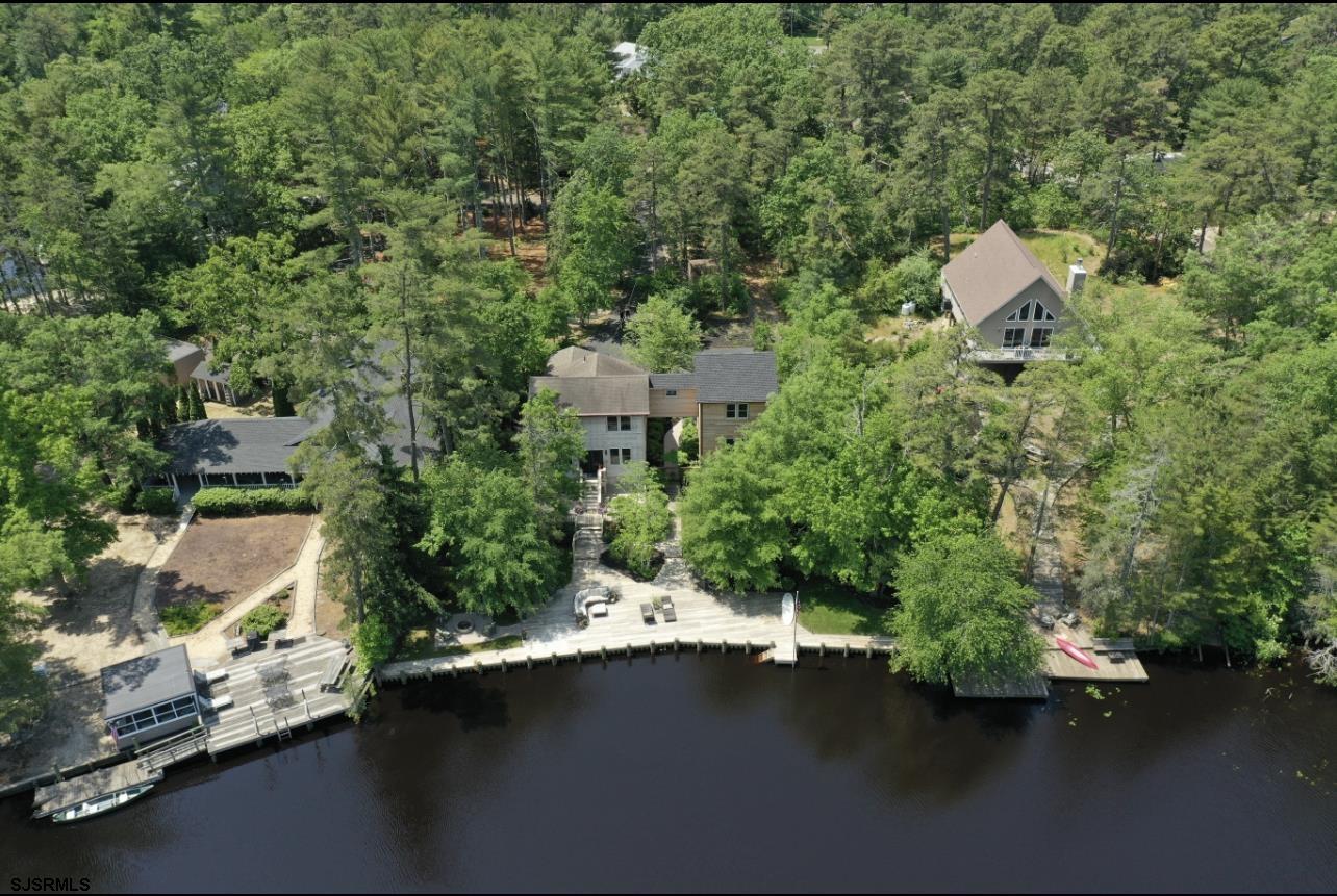 4646 Riverside Drive Sweetwater, NJ 08037 - Photo 16 of 55 an aerial view of a house with a yard basket ball court and outdoor seating