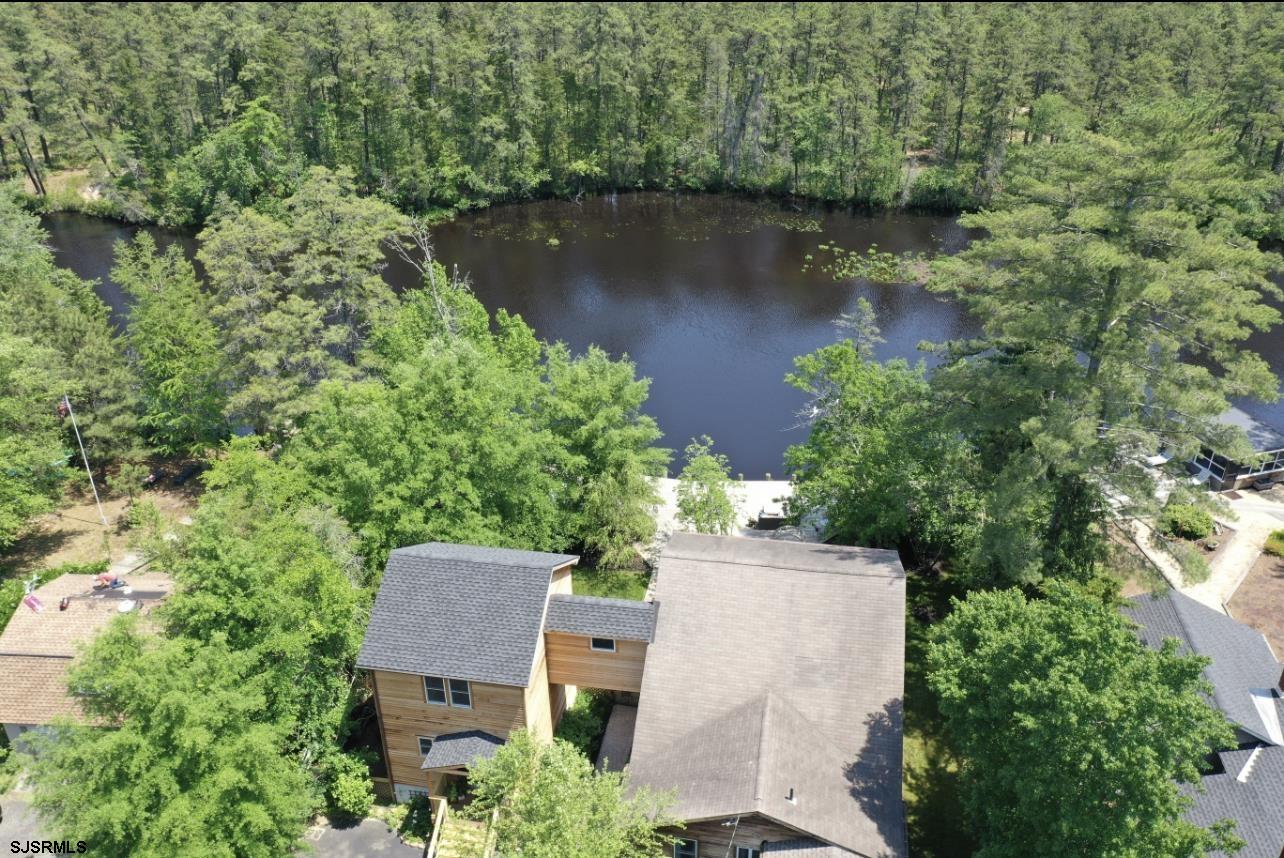 4646 Riverside Drive Sweetwater, NJ 08037 - Photo 20 of 55 an aerial view of a house with a yard and lake view