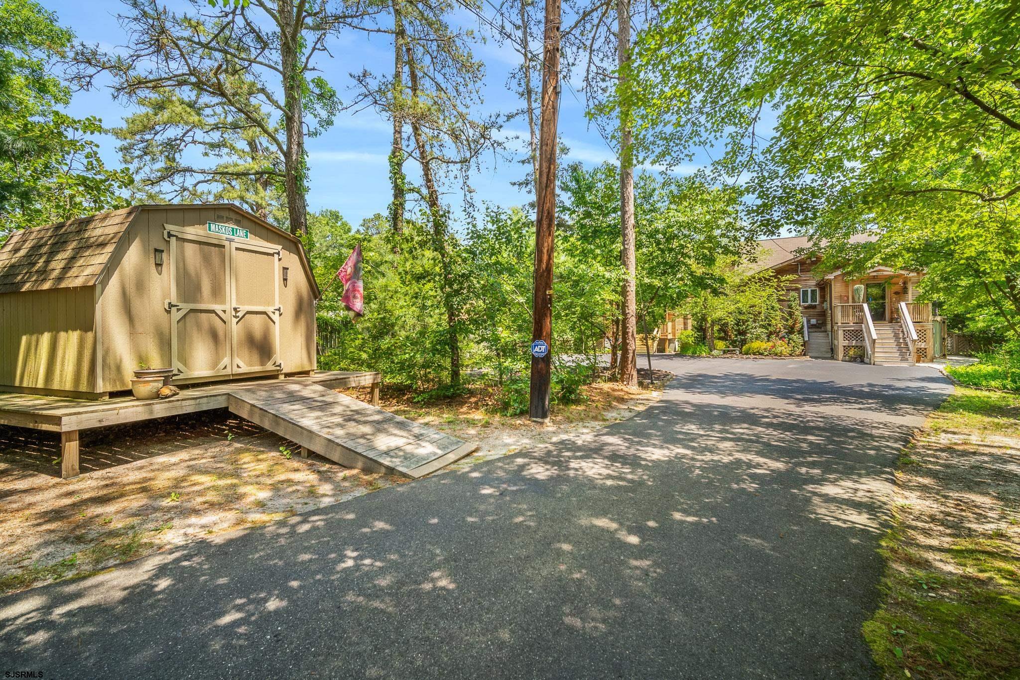 4646 Riverside Drive Sweetwater, NJ 08037 - Photo 22 of 55 a view of a house with a yard