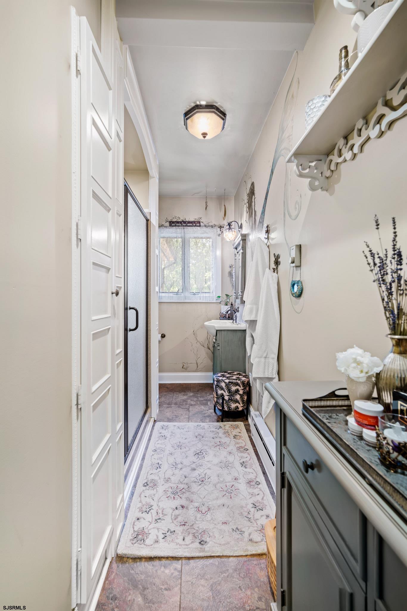 4646 Riverside Drive Sweetwater, NJ 08037 - Photo 34 of 55 a kitchen with refrigerator and window