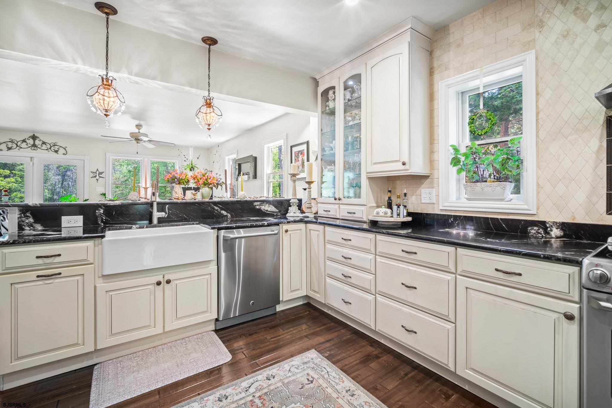 4646 Riverside Drive Sweetwater, NJ 08037 - Photo 38 of 55 a kitchen with cabinets and window