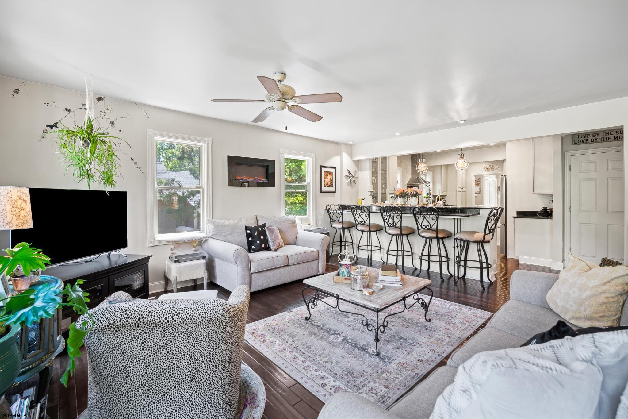 4646 Riverside Drive Sweetwater, NJ 08037 - Photo 43 of 55 a living room with furniture and a flat screen tv