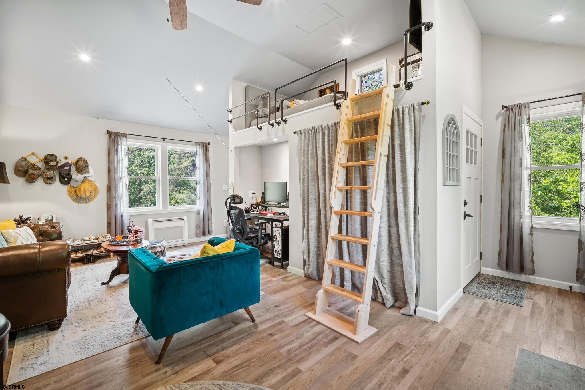 4646 Riverside Drive Sweetwater, NJ 08037 - Photo 48 of 55 a living room with furniture and a large window