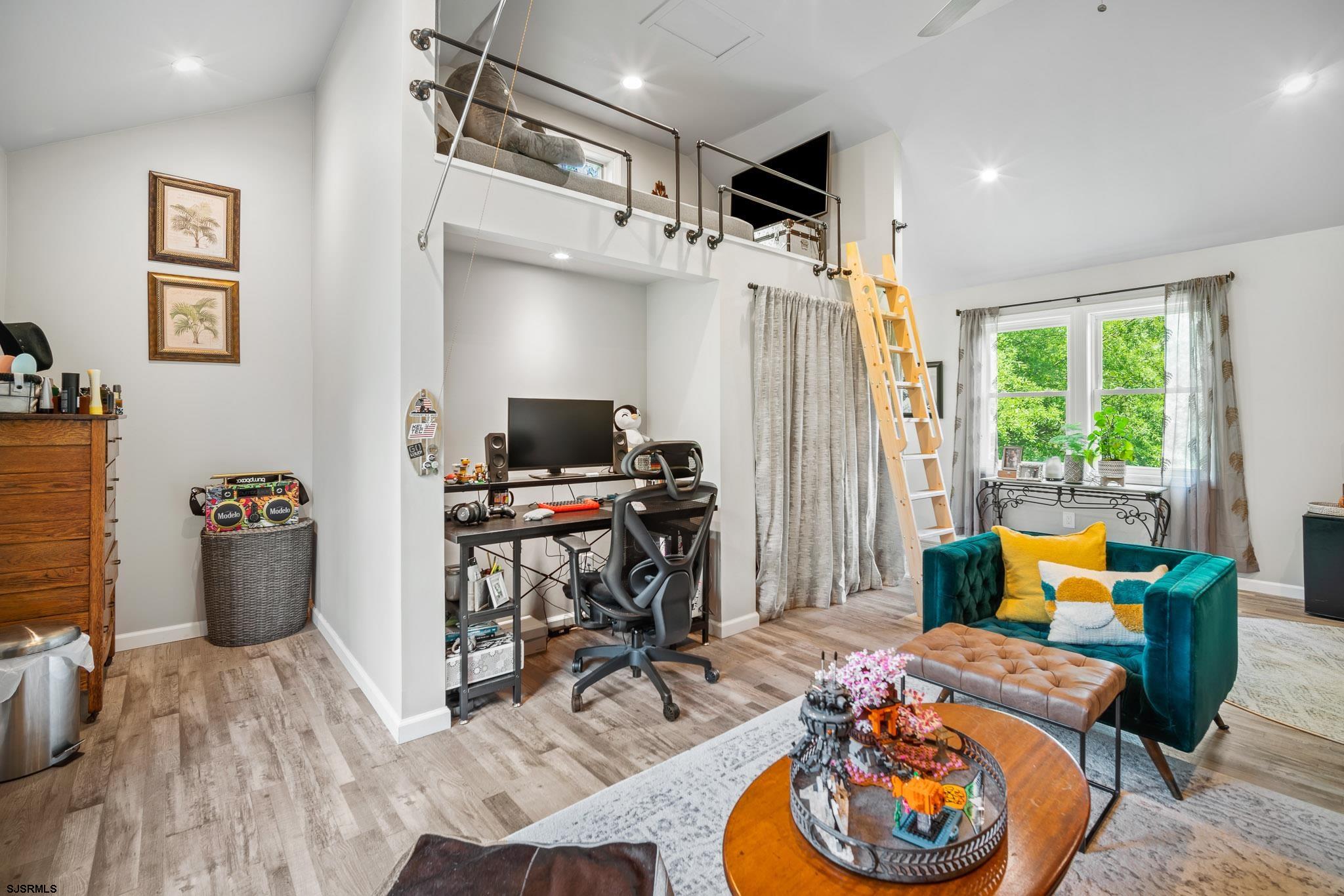 4646 Riverside Drive Sweetwater, NJ 08037 - Photo 49 of 55 a view of a workspace with furniture and a window