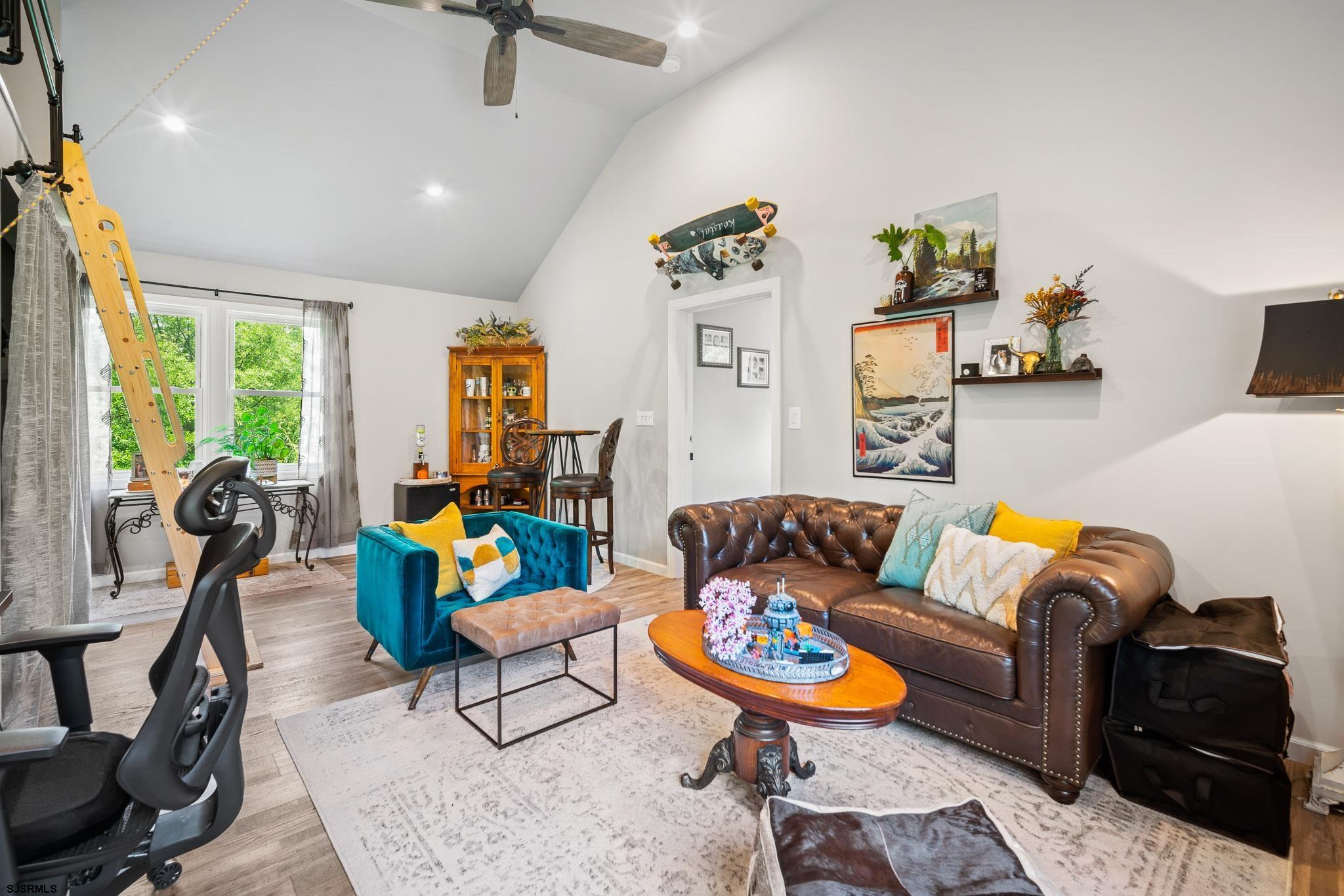 4646 Riverside Drive Sweetwater, NJ 08037 - Photo 50 of 55 a living room with furniture and wooden floor