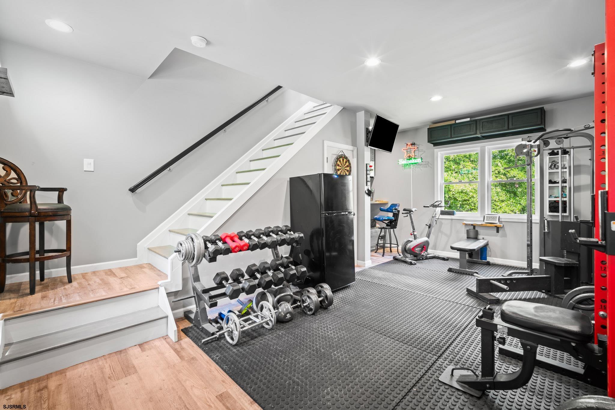 4646 Riverside Drive Sweetwater, NJ 08037 - Photo 51 of 55 a living room with furniture gym equipment and large window