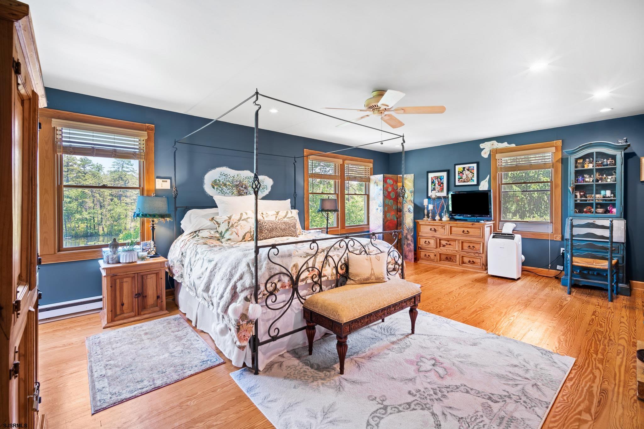 4646 Riverside Drive Sweetwater, NJ 08037 - Photo 53 of 55 a bed room with a bed and a couch