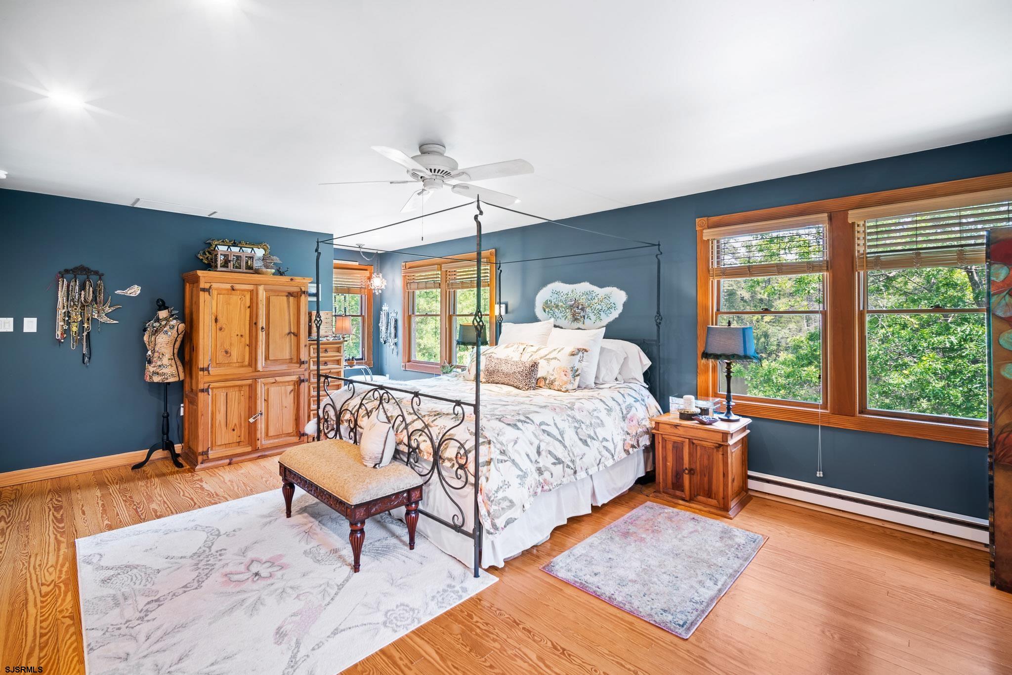 4646 Riverside Drive Sweetwater, NJ 08037 - Photo 54 of 55 a bedroom with a bed chair and window