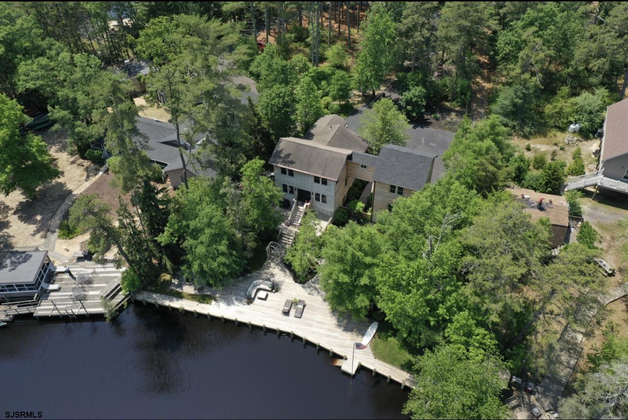 4646 Riverside Drive Sweetwater, NJ 08037 - Photo 10 of 55 an aerial view of a house with a yard basket ball court and outdoor seating