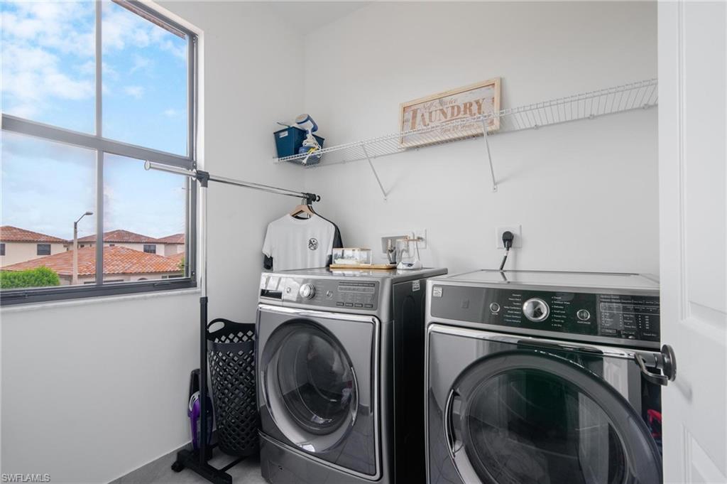 5519 Useppa Drive Ave Maria, FL 34142 - Photo 24 of 32 a view of washer and dryer in a utility room