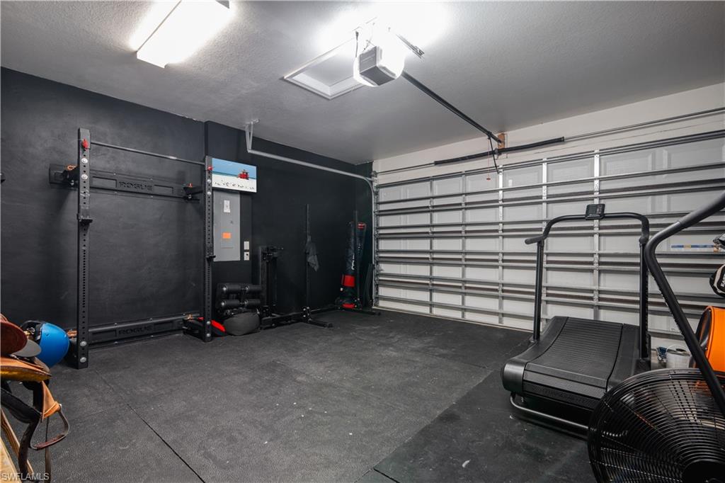 5519 Useppa Drive Ave Maria, FL 34142 - Photo 31 of 32 a view of a room with gym equipment