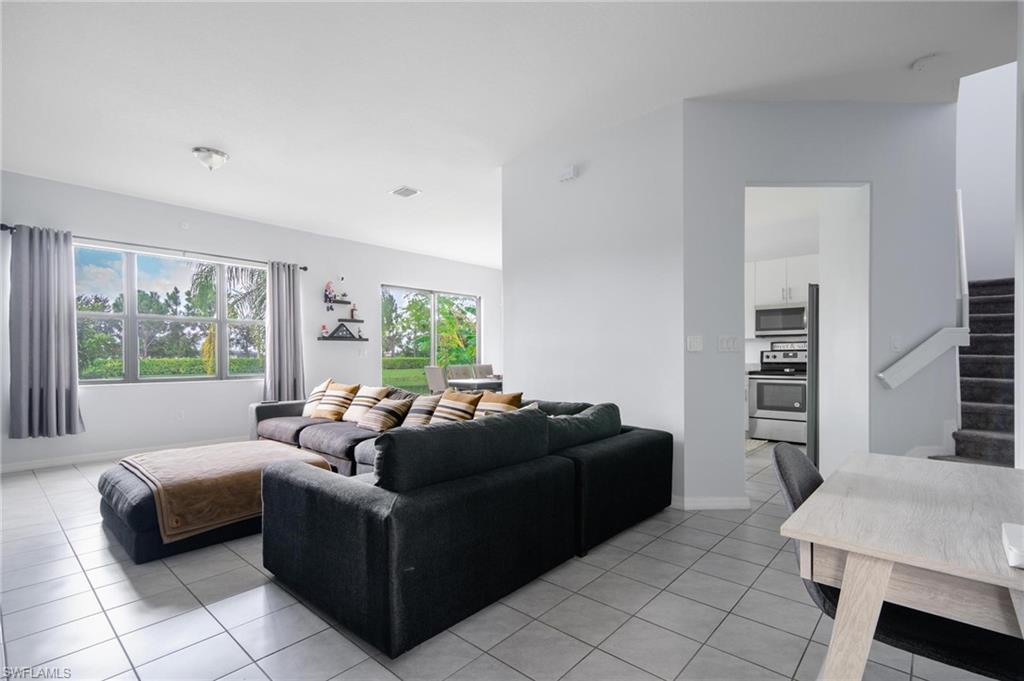 5519 Useppa Drive Ave Maria, FL 34142 - Photo 4 of 32 a living room with furniture and a large window