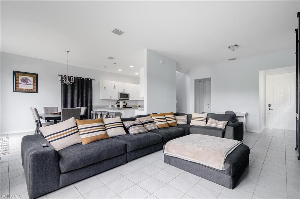 5519 Useppa Drive Ave Maria, FL 34142 - Photo 5 of 32 a living room with furniture and a couch