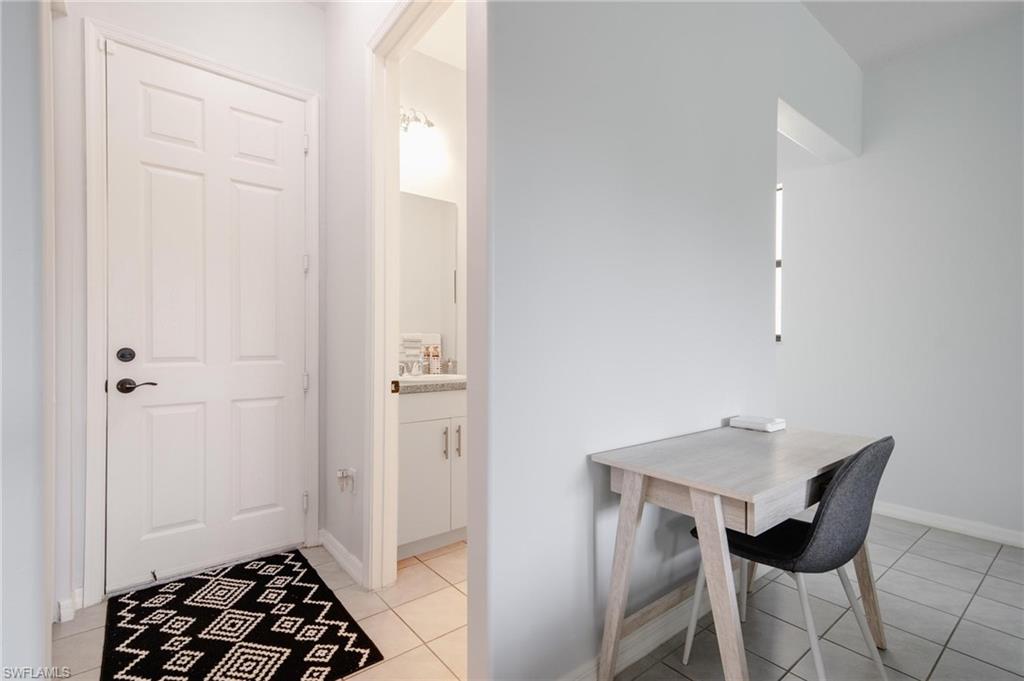 5519 Useppa Drive Ave Maria, FL 34142 - Photo 6 of 32 a view of a room with a table and chairs