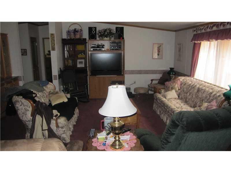 1080 Main Road Eddington, ME 04428 - Photo 9 of 15 Living Room.