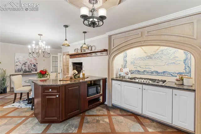 a view of a kitchen with a sink cabinets and window