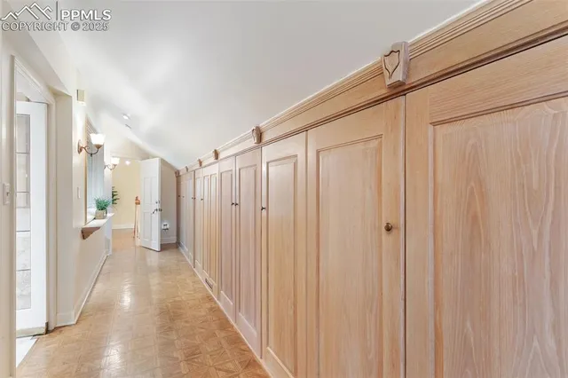 a view of a bathroom with shower curtain