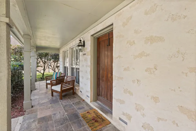 a view of living room filled with furniture