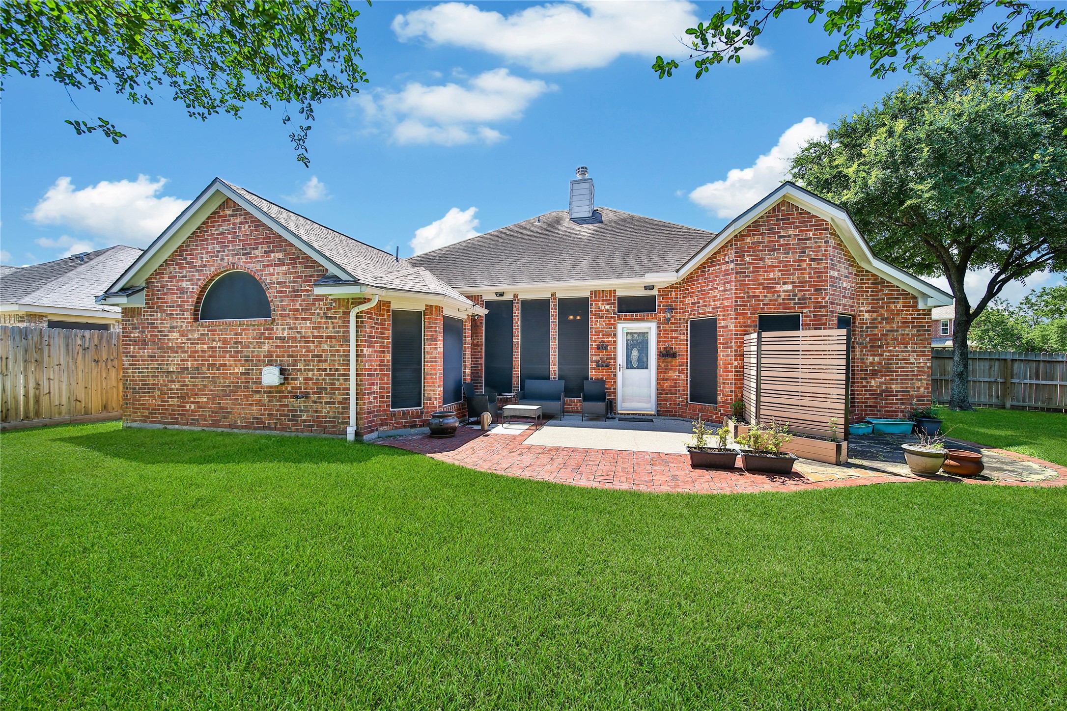 21338 Timber Pines Drive Spring, TX 77388 - Photo 26 of 29 a front view of a house with a yard and green space
