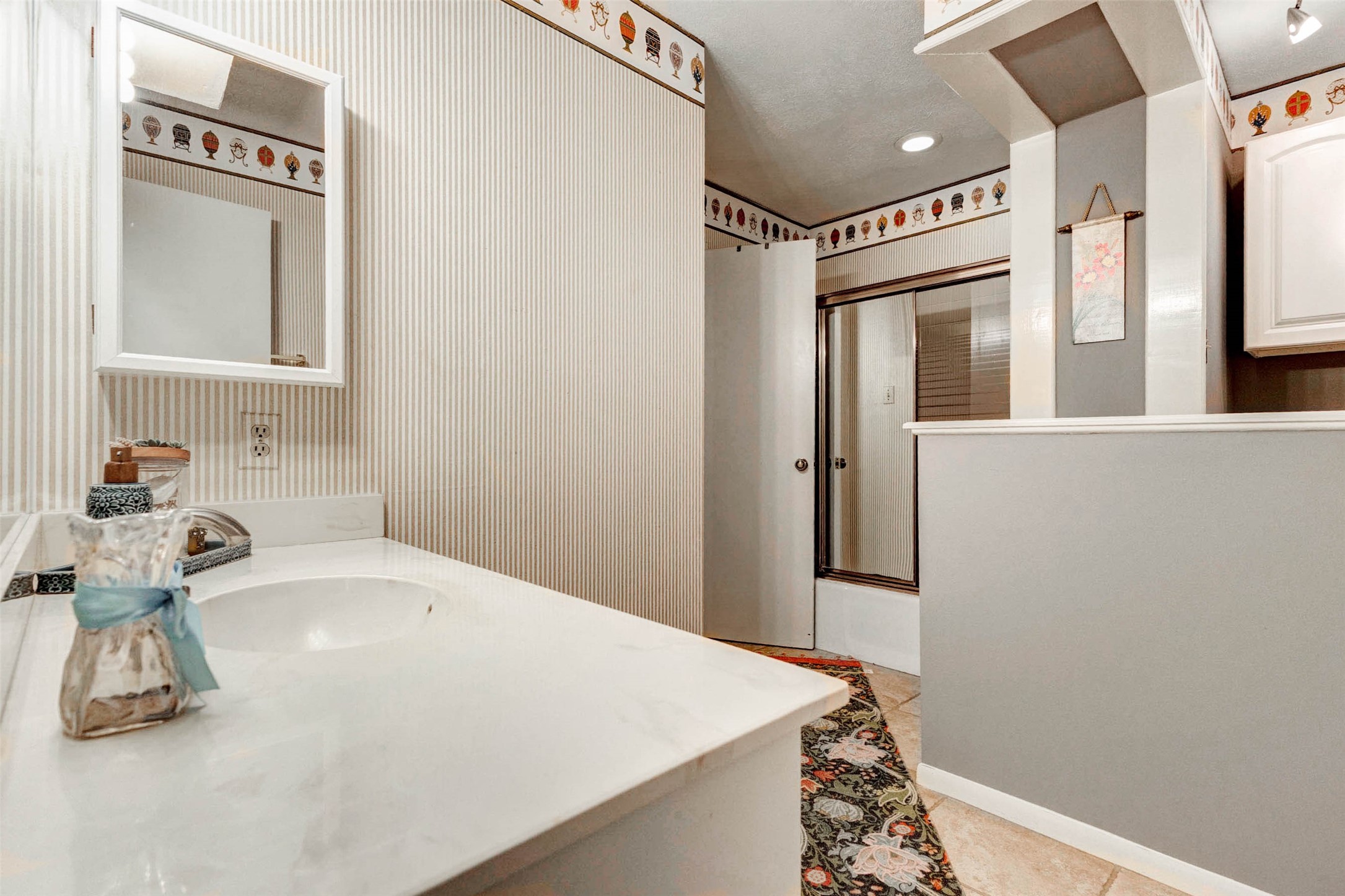 202 Old Bridge Lake Street Houston, TX 77069 - Photo 15 of 27 a bathroom with a sink and a mirror