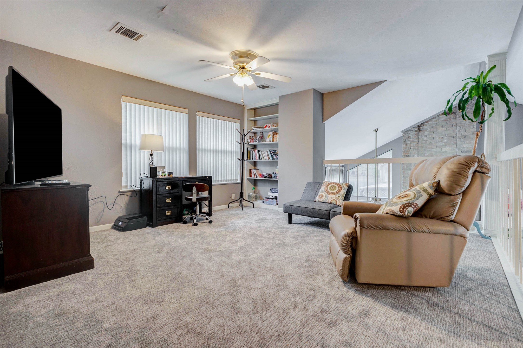 202 Old Bridge Lake Street Houston, TX 77069 - Photo 16 of 27 a living room with furniture and a flat screen tv