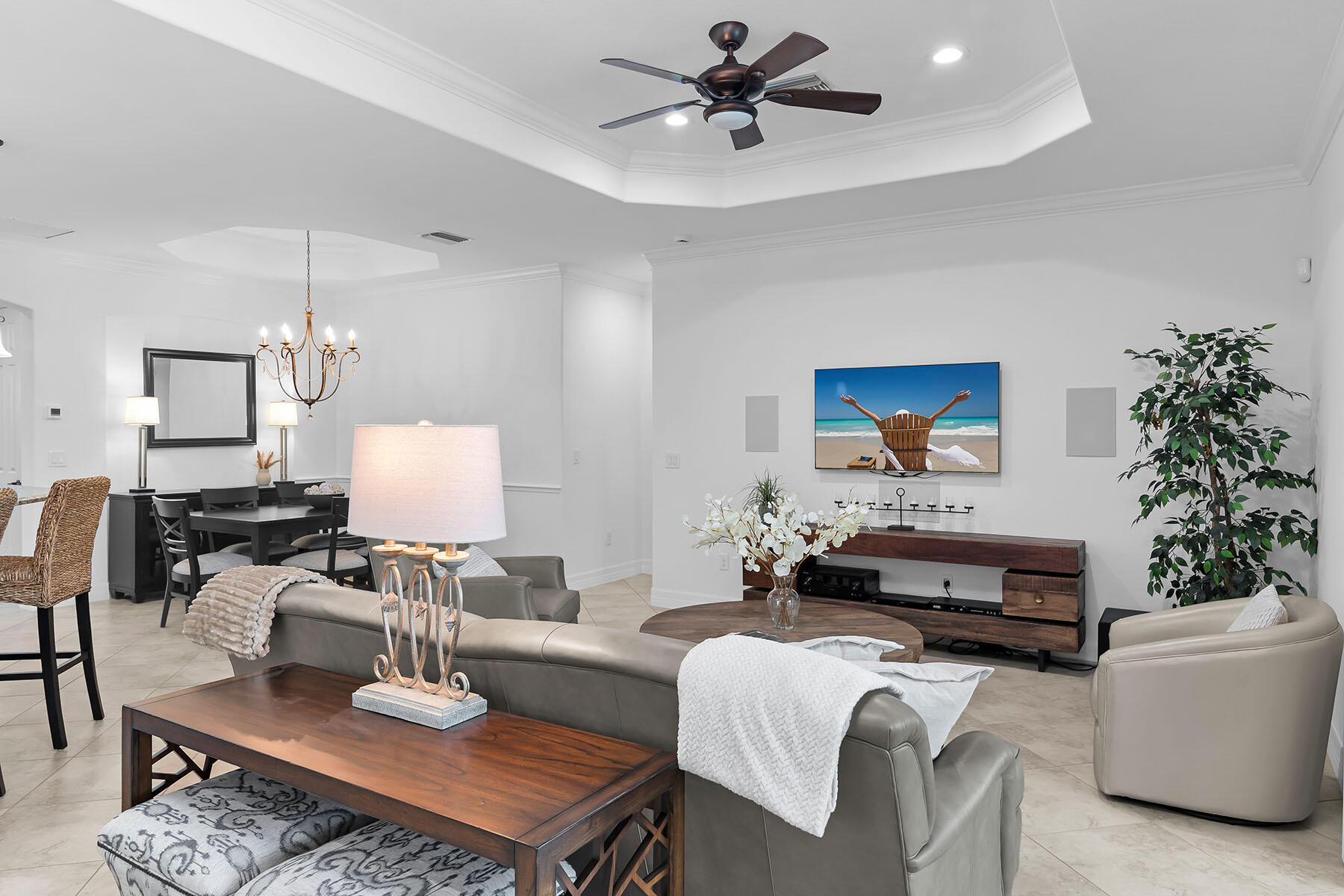 2990 Aviamar Circle Naples, FL 34114 - Photo 13 of 44 a living room with furniture and a wooden floor
