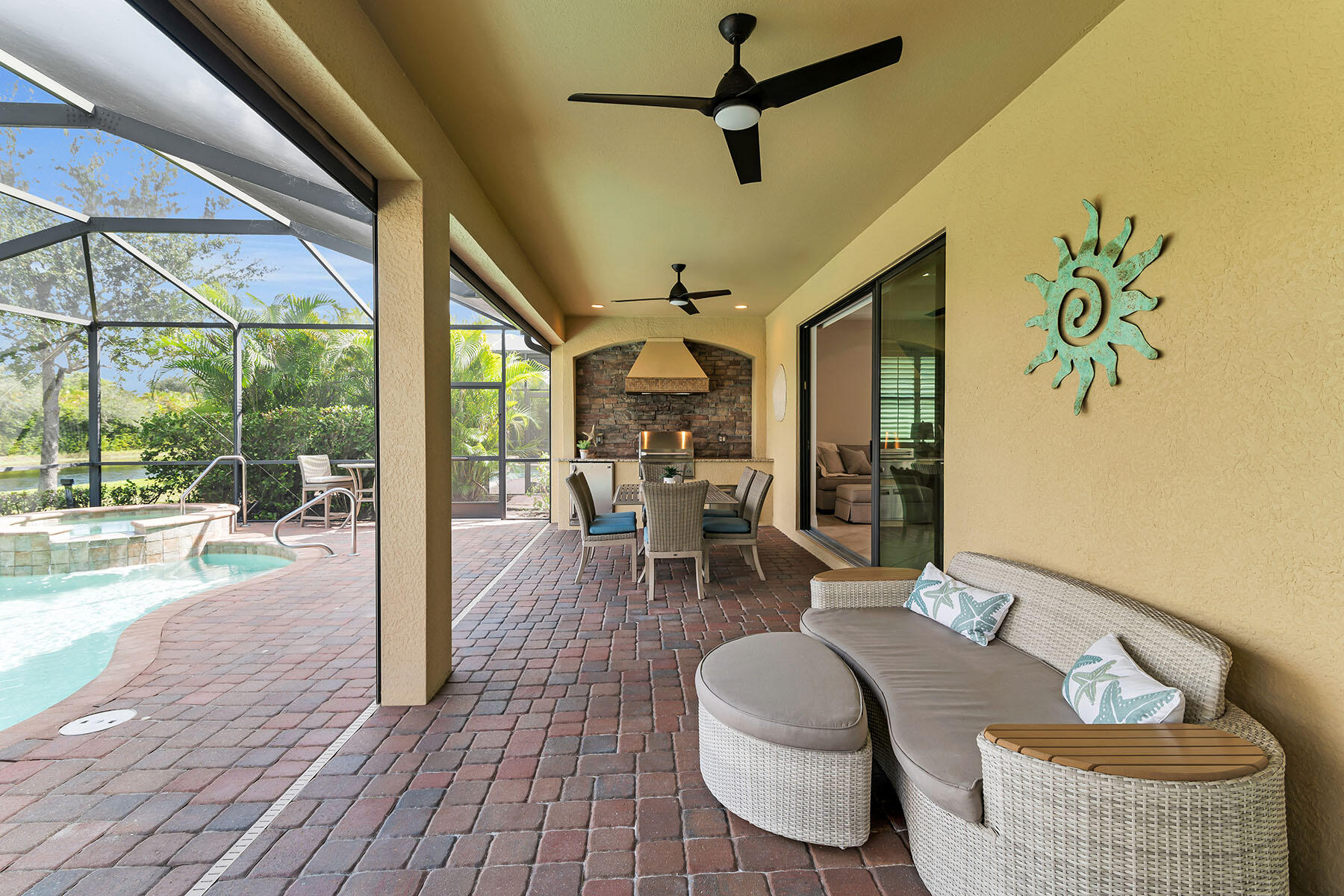 2990 Aviamar Circle Naples, FL 34114 - Photo 27 of 44 a living room with furniture and a large window