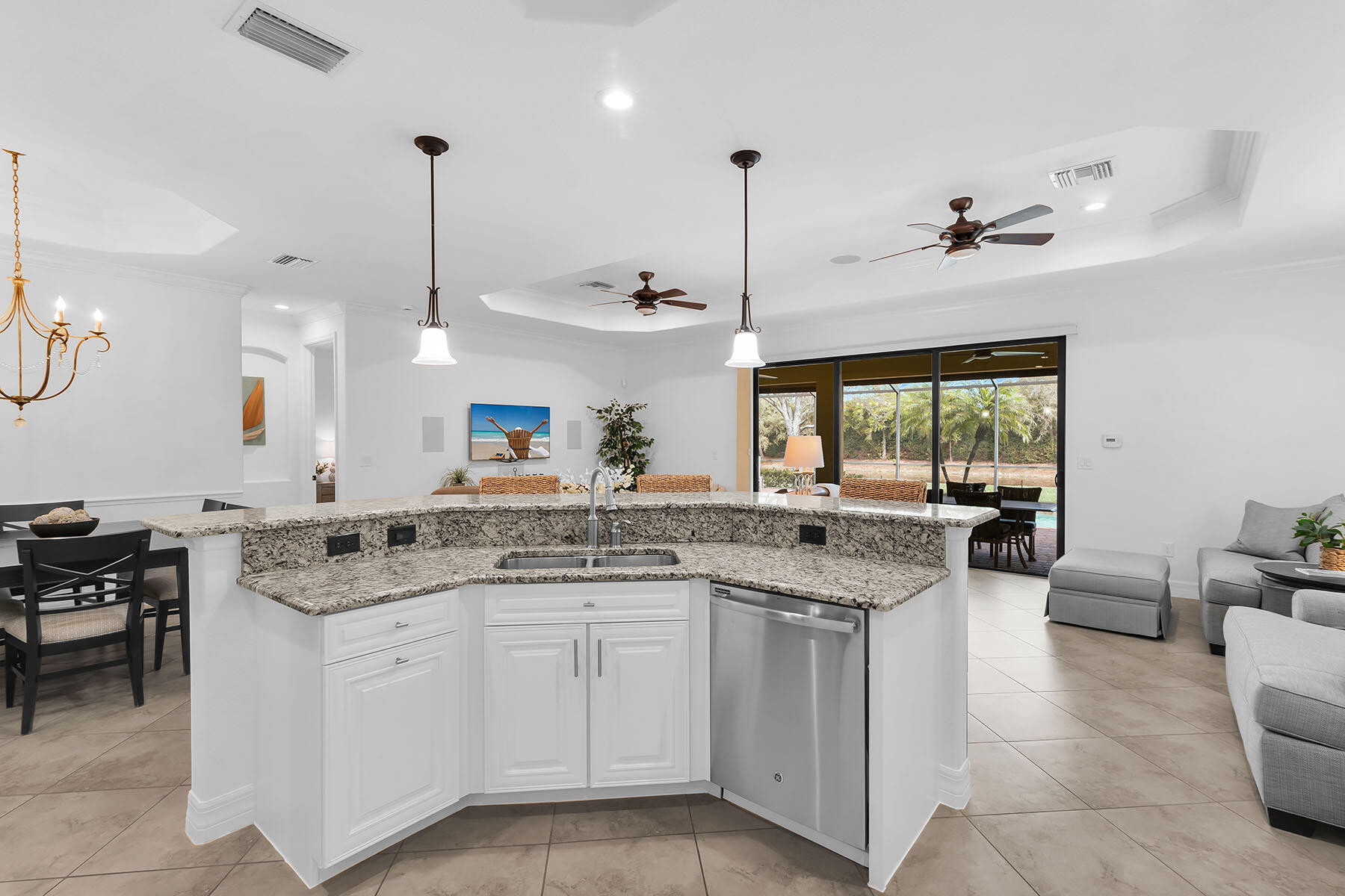 2990 Aviamar Circle Naples, FL 34114 - Photo 7 of 44 a kitchen with a sink stove and cabinets