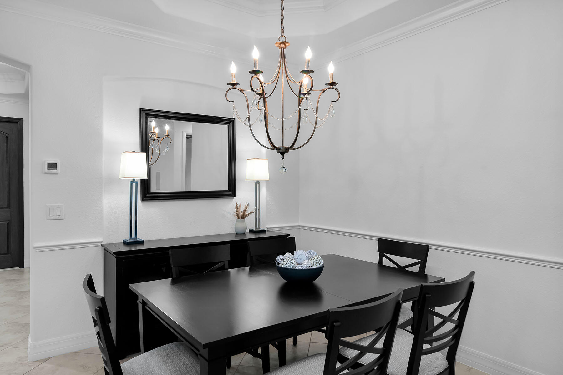2990 Aviamar Circle Naples, FL 34114 - Photo 9 of 44 a view of a dining room with furniture and wooden floor