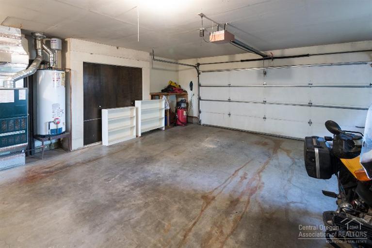 61839 Dobbin Road Bend, OR 97702 - Photo 18 of 23 a view of a garage with storage