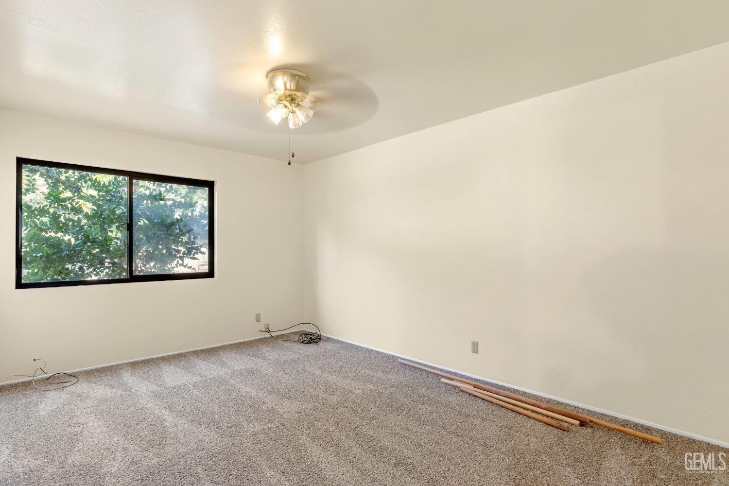 Undisclosed Address Tehachapi, CA 93561 - Photo 19 of 37 a view of an empty room with a window
