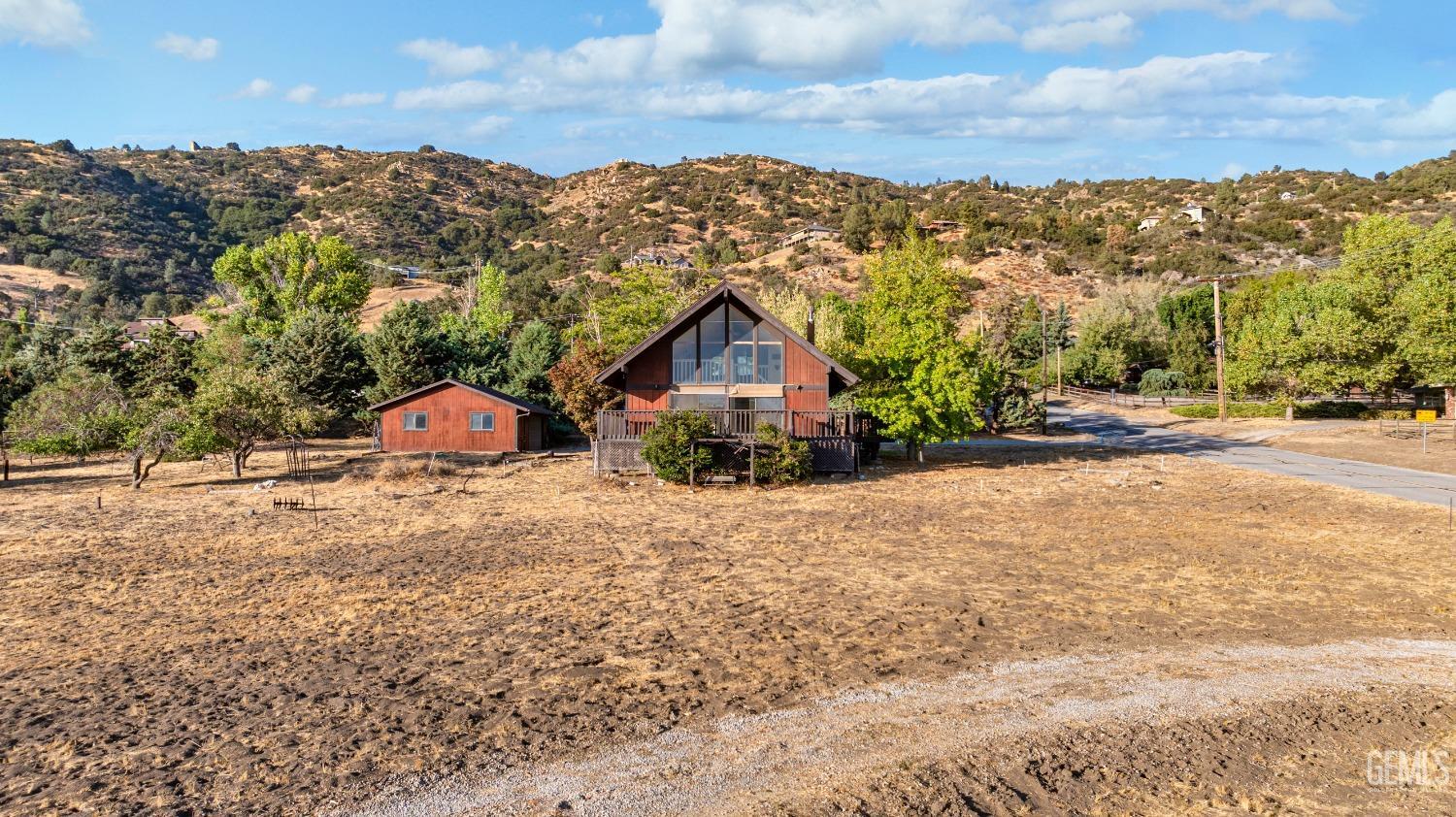 Undisclosed Address Tehachapi, CA 93561 - Photo 26 of 37 a view of a house with a mountain