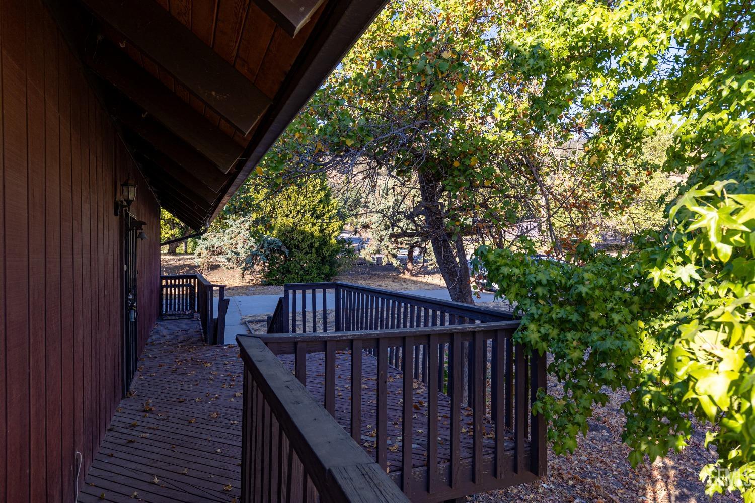 Undisclosed Address Tehachapi, CA 93561 - Photo 6 of 37 a view of backyard with deck and wooden floor