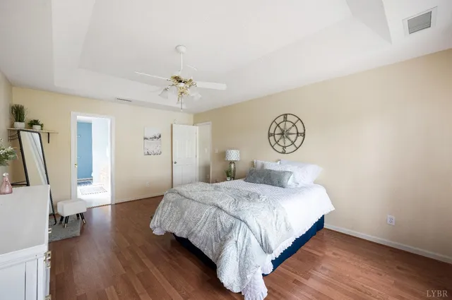 a view of a bathroom with a glass door and a bathroom