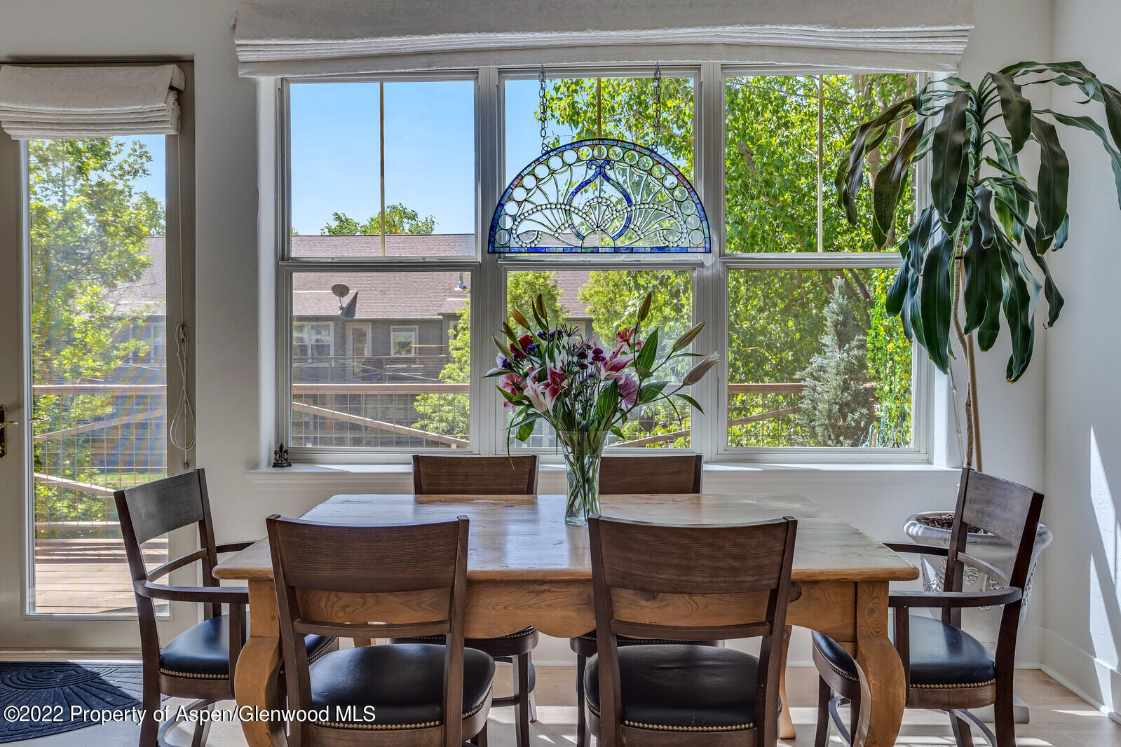 620 Evans Court Basalt, CO 81621 - Photo 14 of 35 a view of a dining room with furniture window and outside view
