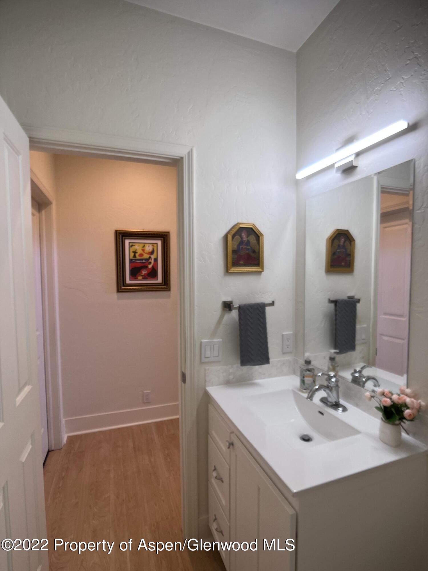 620 Evans Court Basalt, CO 81621 - Photo 17 of 35 a bathroom with a sink and a mirror