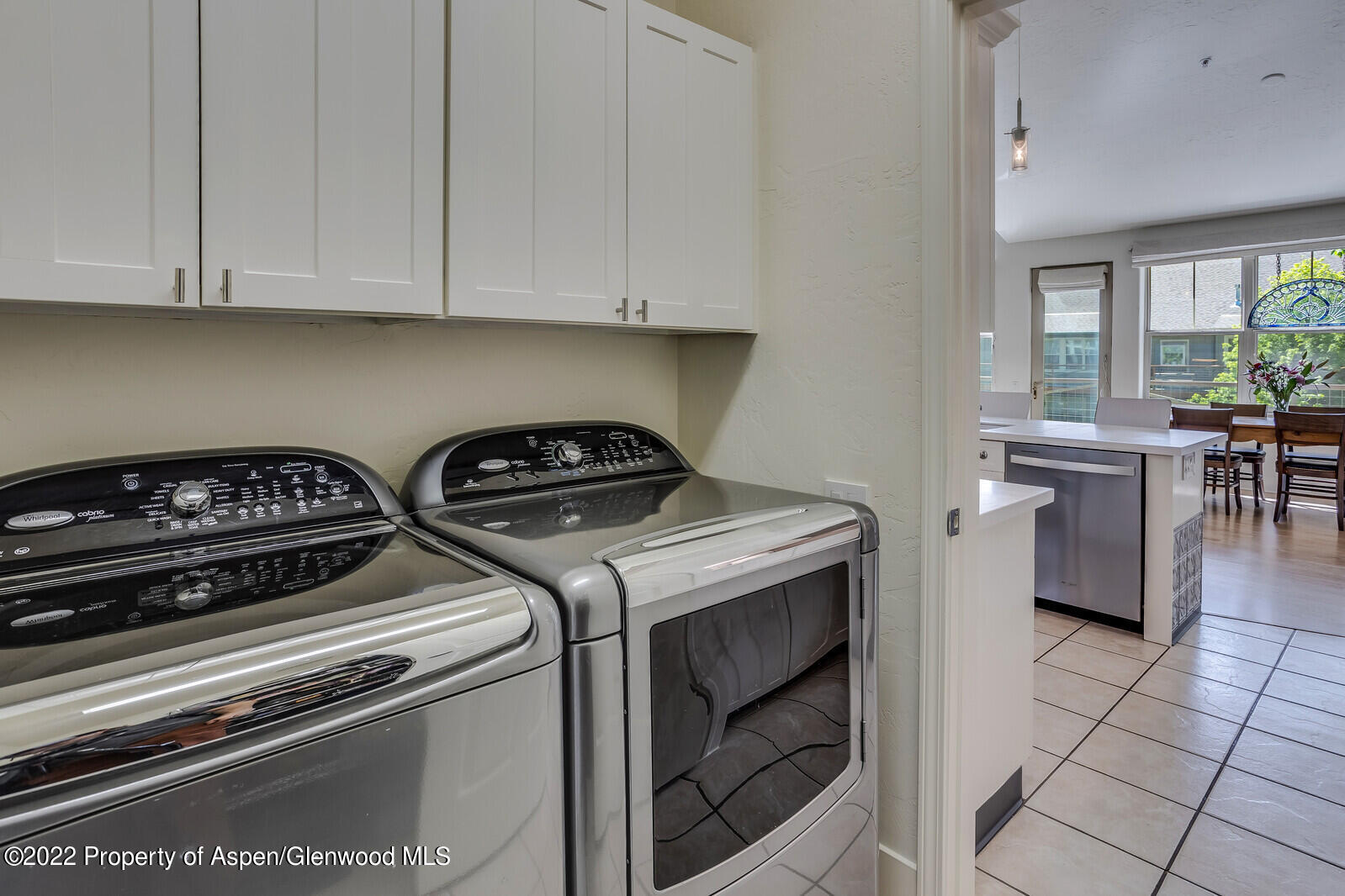 620 Evans Court Basalt, CO 81621 - Photo 18 of 35 a kitchen with a stove and white cabinets