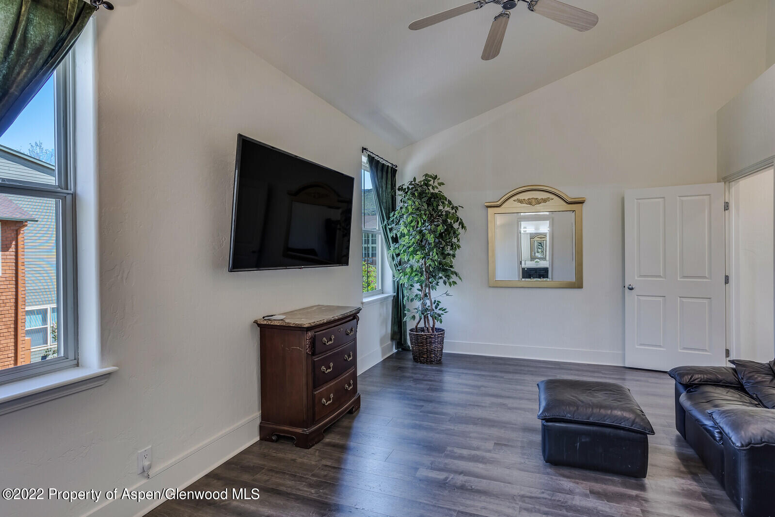 620 Evans Court Basalt, CO 81621 - Photo 19 of 35 a living room with furniture and a flat screen tv