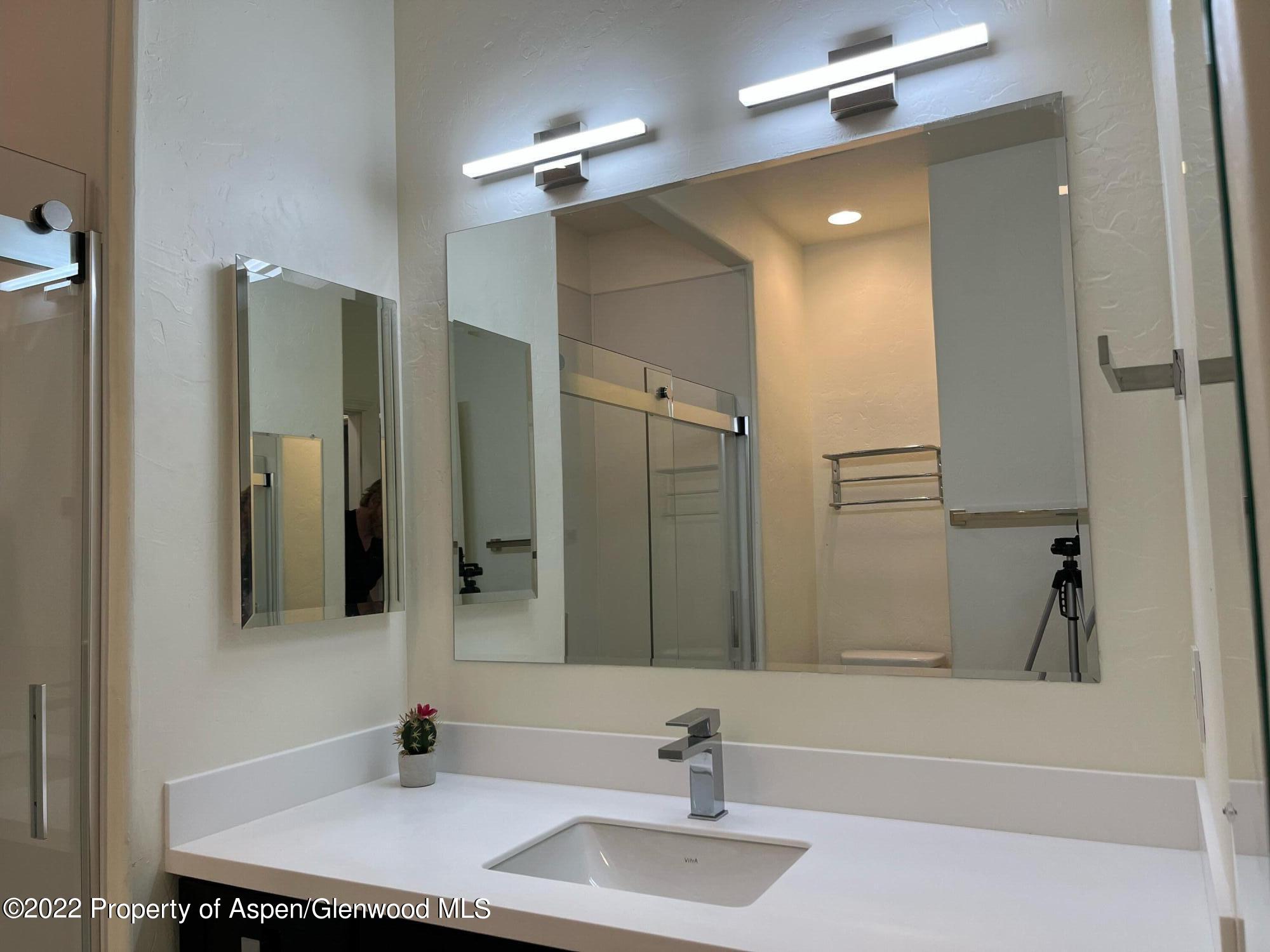620 Evans Court Basalt, CO 81621 - Photo 27 of 35 a bathroom with a sink and a mirror