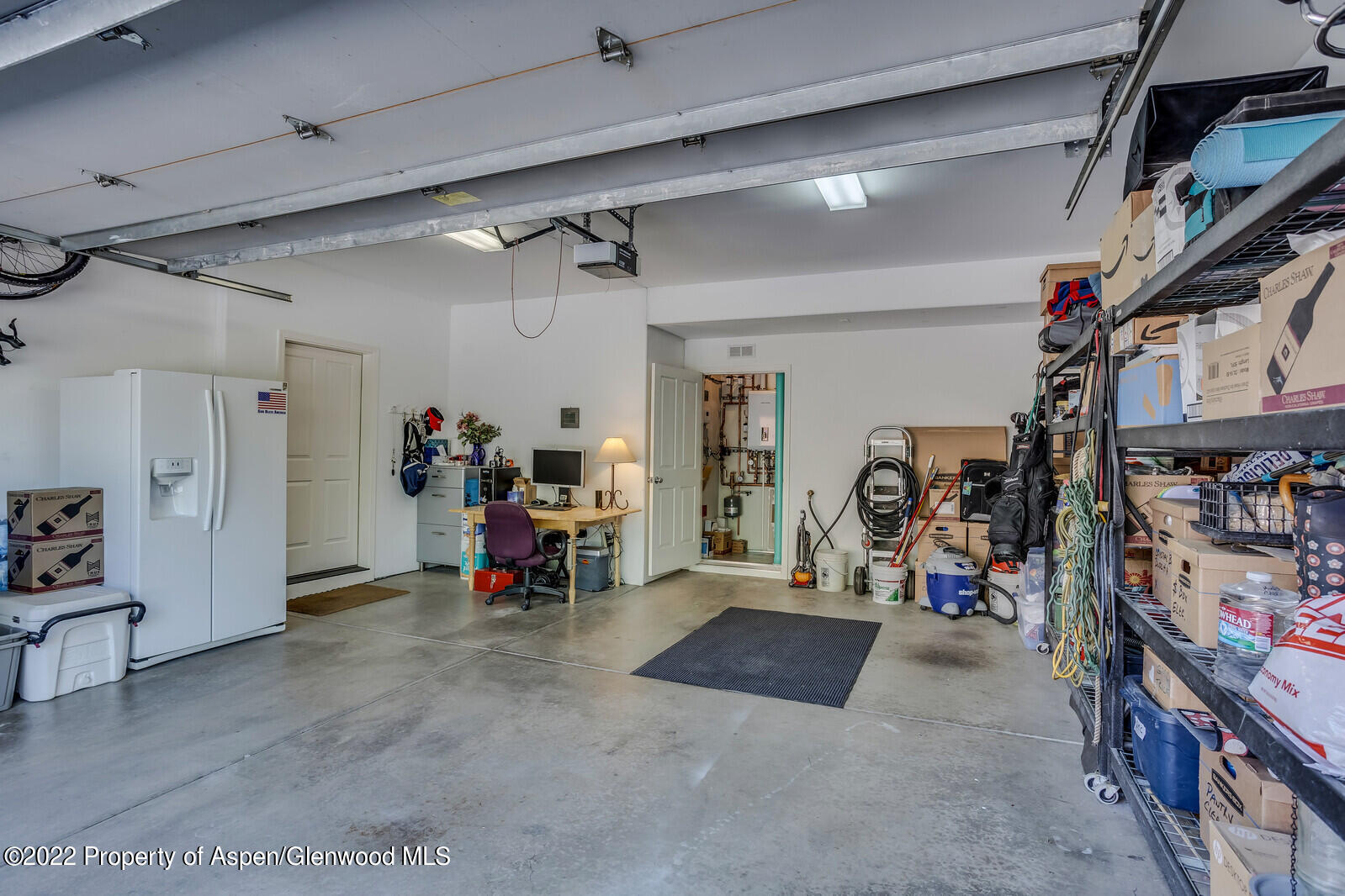 620 Evans Court Basalt, CO 81621 - Photo 28 of 35 a view of a garage with rack and bicycle