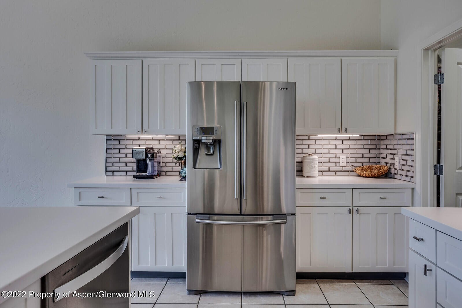 620 Evans Court Basalt, CO 81621 - Photo 3 of 35 a kitchen with cabinets stainless steel appliances and a sink