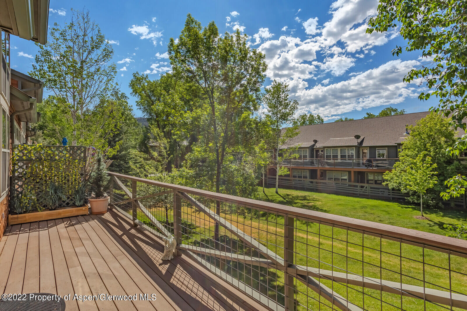 620 Evans Court Basalt, CO 81621 - Photo 4 of 35 a view of a balcony with wooden floor and fence