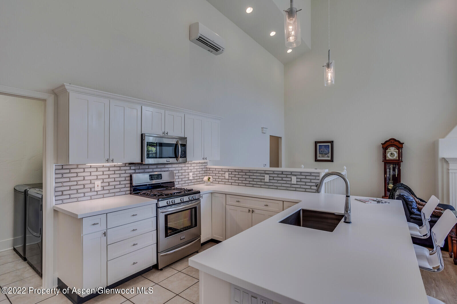 620 Evans Court Basalt, CO 81621 - Photo 6 of 35 a kitchen with white cabinets and appliances